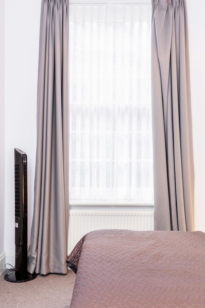 Harrods Luxury Apartments - Tap to explore photos