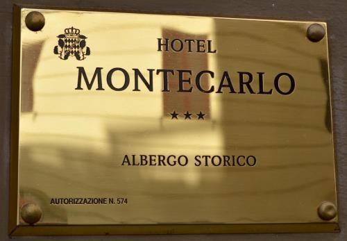 Hotel Montecarlo - Tap to explore photos
