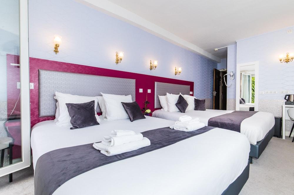 Hotel de Paris Montparnasse Room Type - Family Quadruple Room, 2 Queen Beds, Garden View Hotel de Paris Montparnasse Room Type - Family Quadruple Room, 2 Queen Beds, Garden View