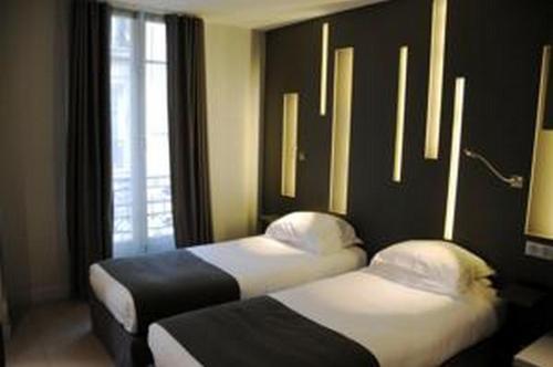 Hotel Arc de Triomphe Etoile - Tap to explore photos