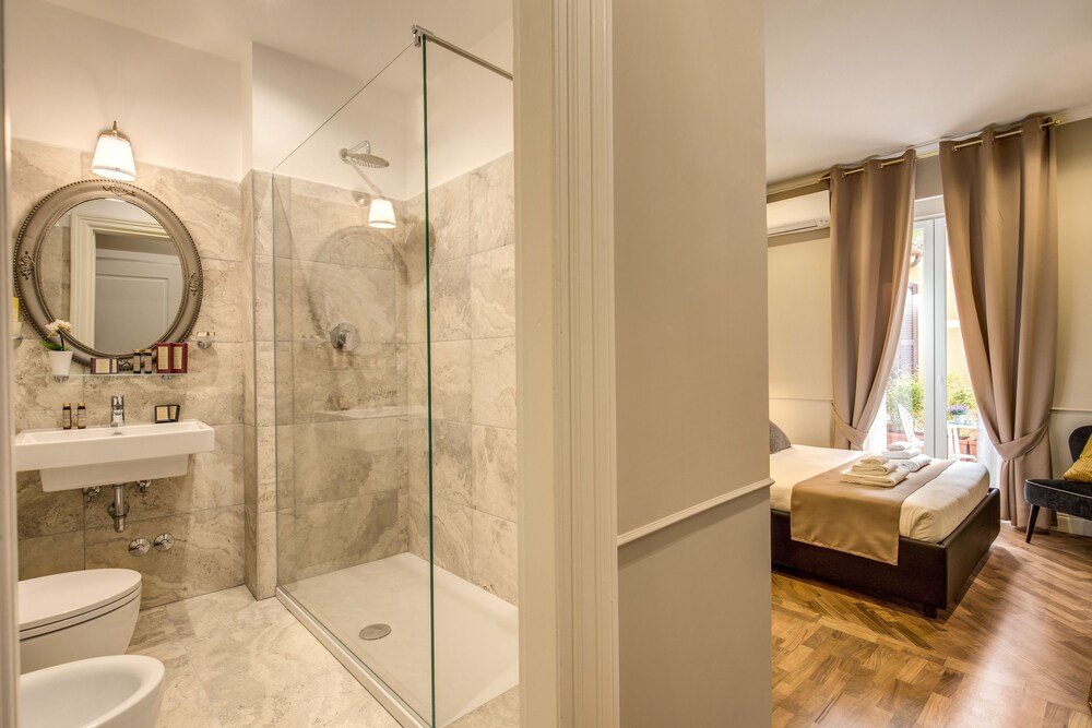 Charme Spagna Boutique Hotel - Tap to explore photos
