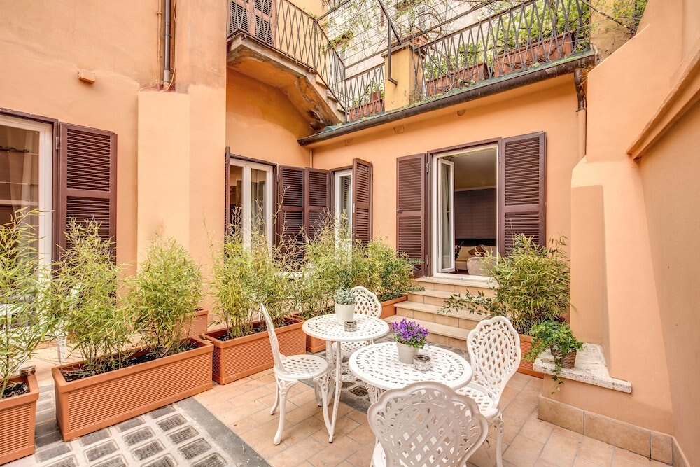 Charme Spagna Boutique Hotel - Tap to explore photos