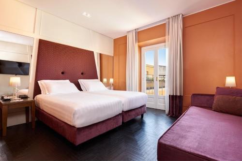 Mascagni Luxury Rooms & Suites - Tap to explore photos