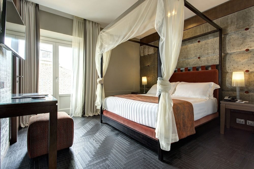 Mascagni Luxury Rooms & Suites - Tap to explore photos