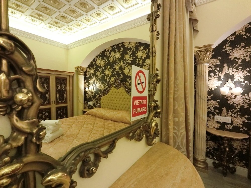 Impero Vaticano Suites Guest House - Tap to explore photos