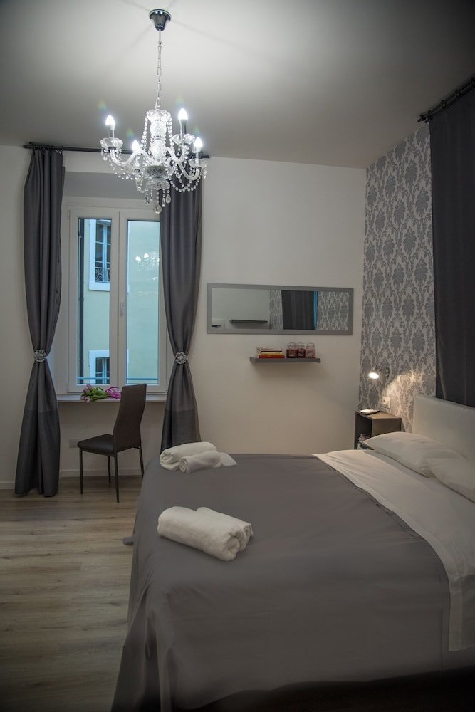 Inside Roma Rooms - Tap to explore photos