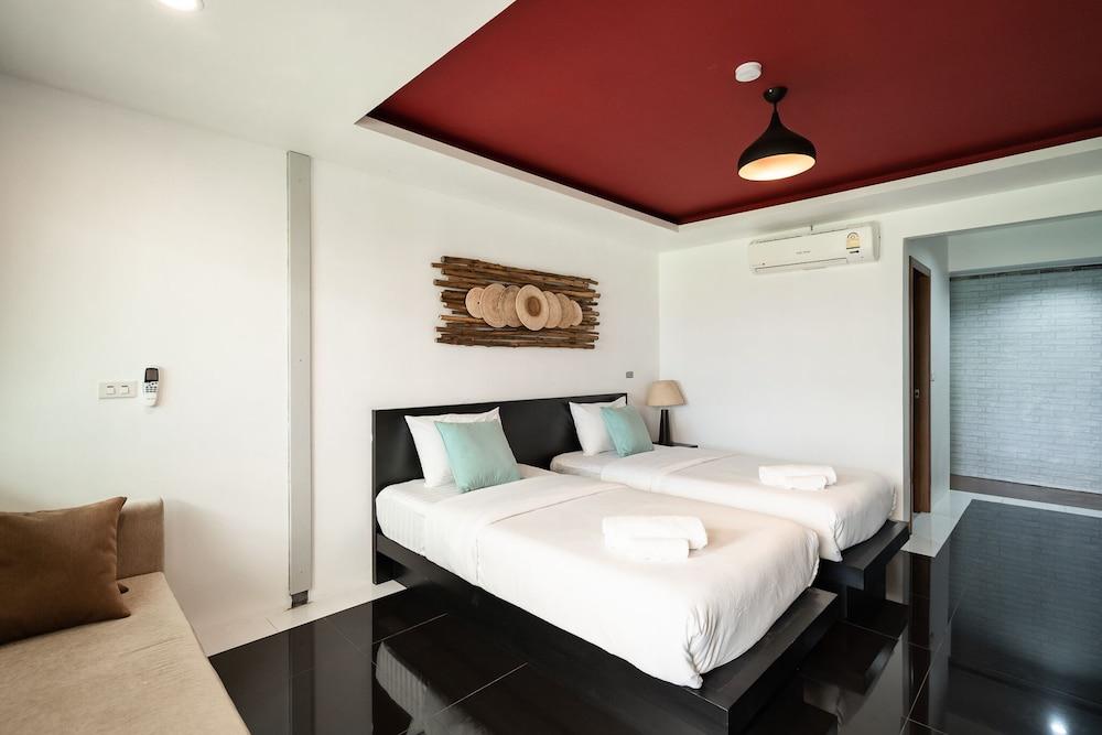 The Loft Panwa Resort - Tap to explore photos