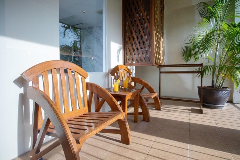 Orchid Garden Hotel Patong - Tap to explore photos