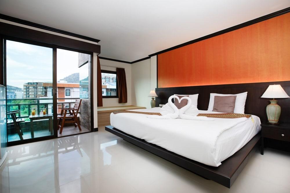 Orchid Garden Hotel Patong - Tap to explore photos