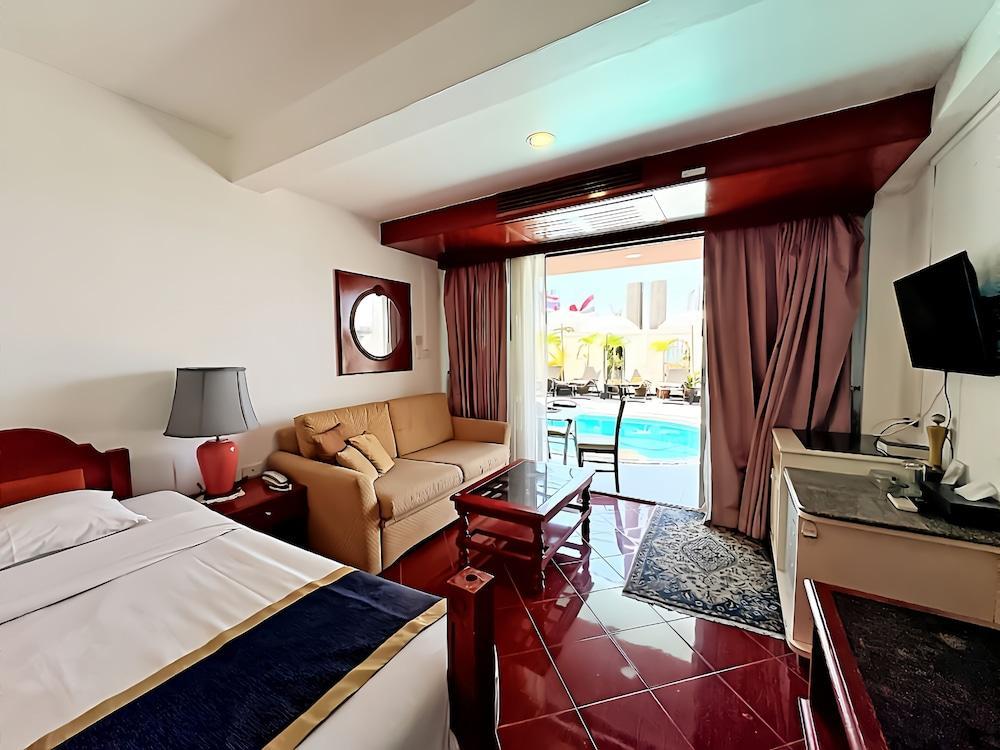 Orchid Hotel and Spa Kalim Bay Room Type - Deluxe Room, Pool Access
