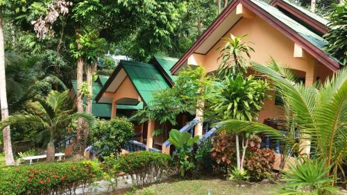 Anawin Bungalows - Tap to explore photos