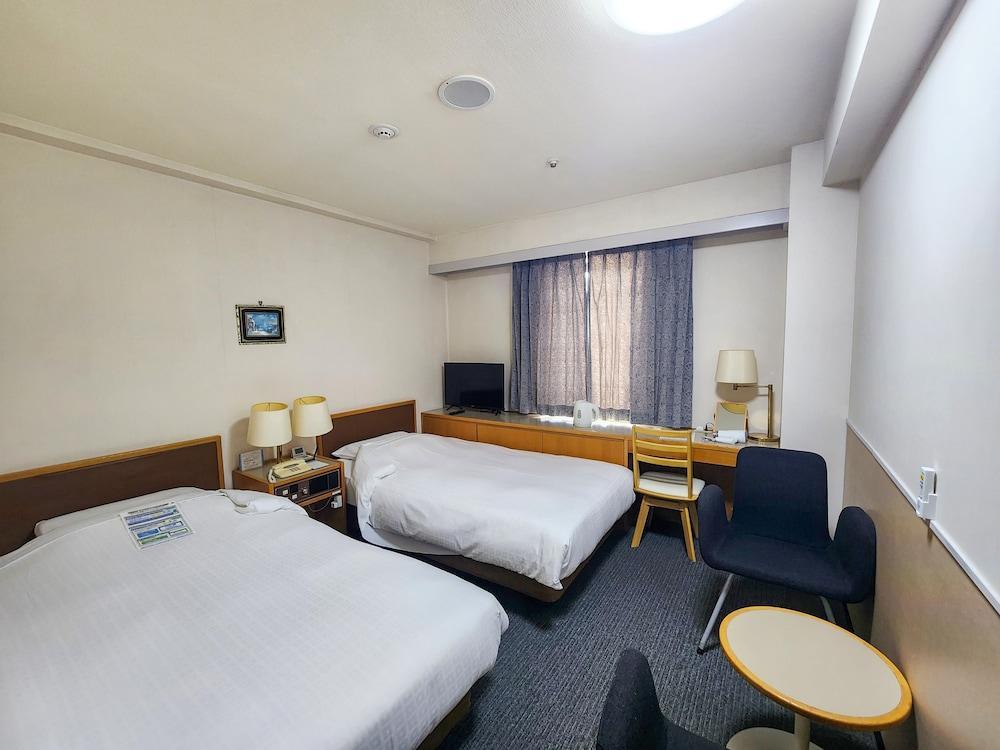 Ichikawa Grand Hotel - Tap to explore photos