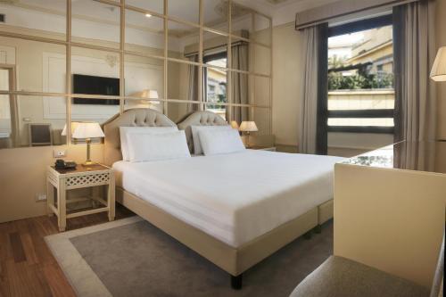 Radisson Blu GHR Hotel, Rome - Tap to explore photos