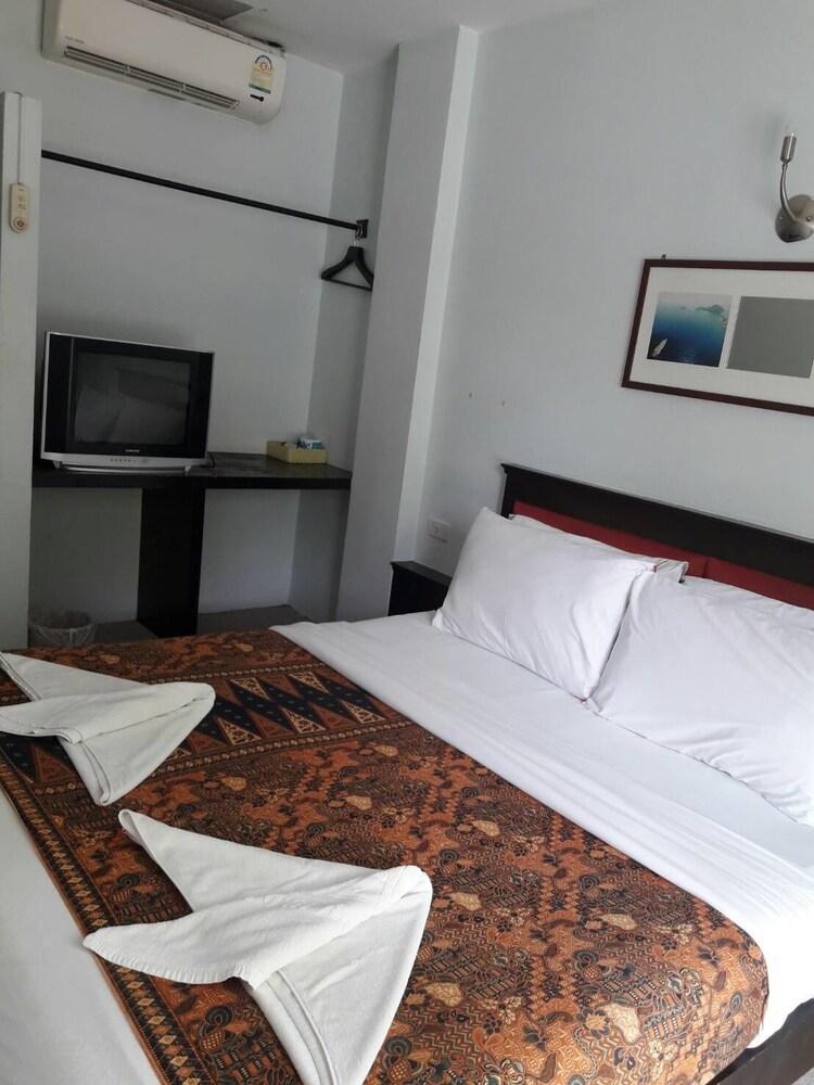 Andaman Legacy Guest House - Tap to explore photos
