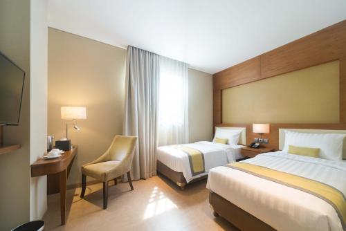 Sotis Residence Pejompongan Room Type - Deluxe Twin Room