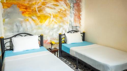 Sabina Guesthouse - Tap to explore photos