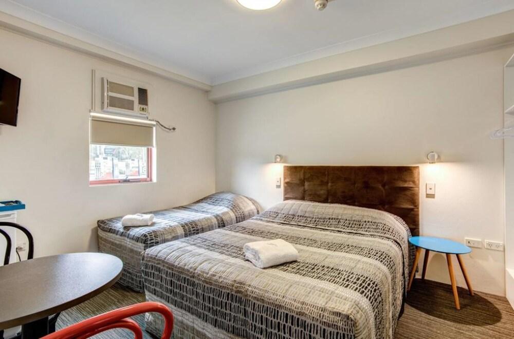 Arena Hotel Room Type - Standard Queen/Single Room