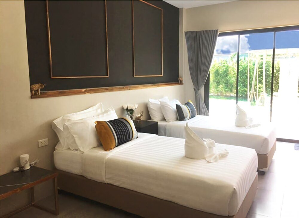 Malinda Villa Phuket - Tap to explore photos
