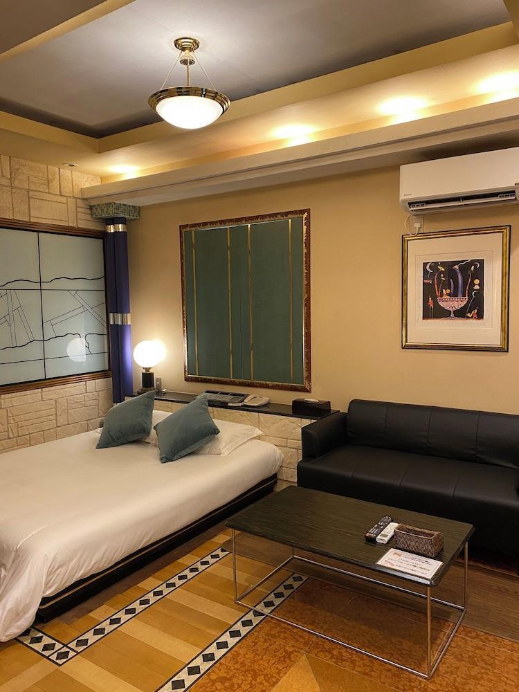 Hotel Takao Asile - Tap to explore photos