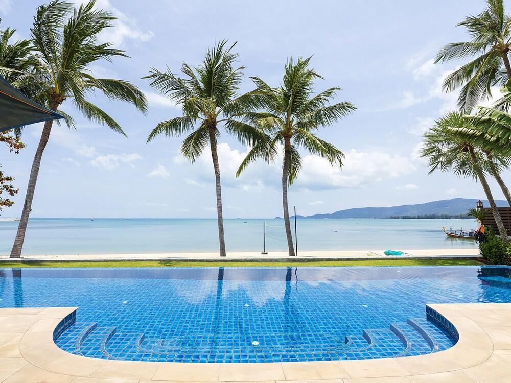 Tawantok Beach Villas - Tap to explore photos