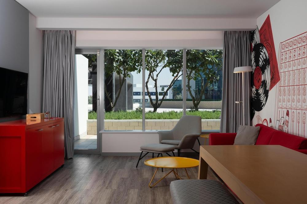 Radisson RED Hotel, Dubai Silicon Oasis Room Type - Apartment - One Bedroom and Terrace Radisson RED Hotel, Dubai Silicon Oasis Room Type - Apartment - One Bedroom and Terrace