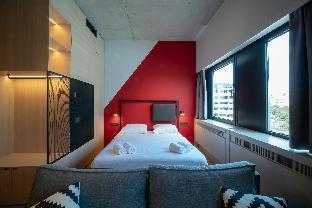 Via Suites - Tap to explore photos