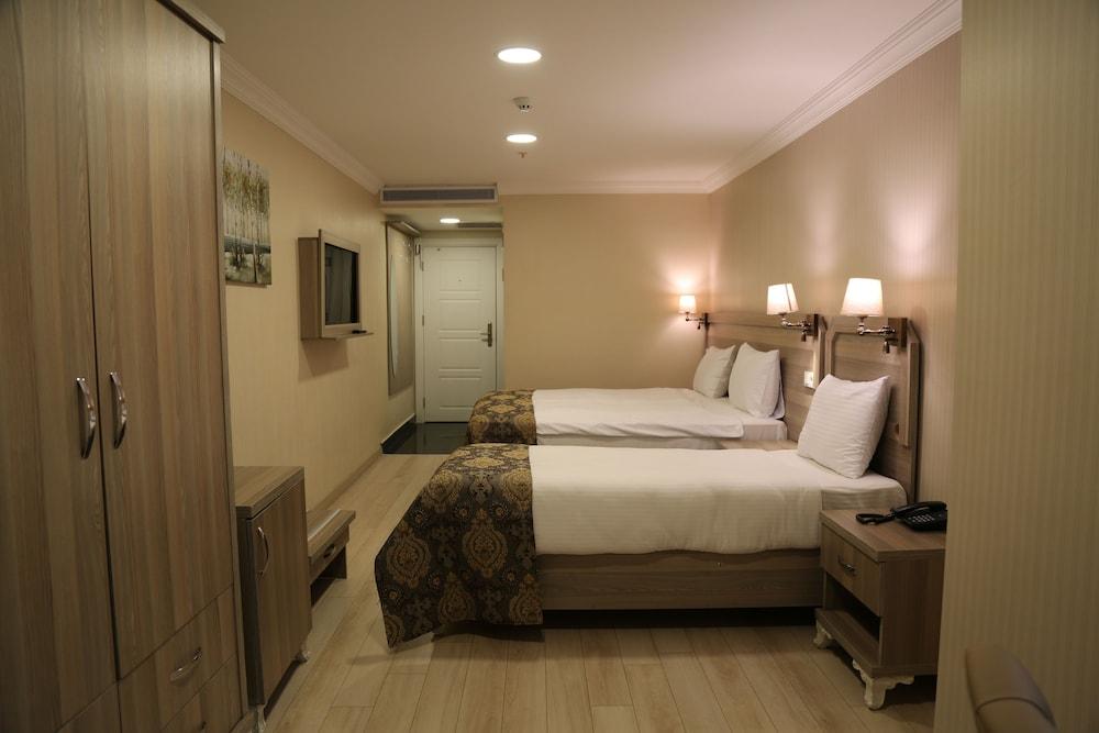 World Point Hotel Besyol Room Type - Standard Triple Room