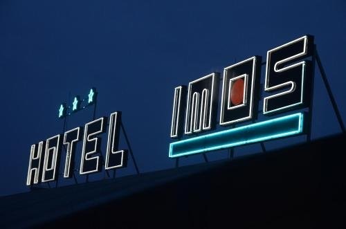 Hotel Imos - Tap to explore photos