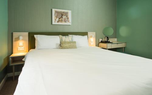 Caring Hotel Room Type - Double Room with Private Bathroom