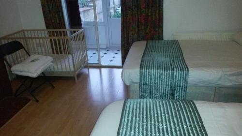 Cedars House Hotel Room Type - Family Room with Shared Bathroom (2 Adults + 2 Children) Cedars House Hotel Room Type - Family Room with Shared Bathroom (2 Adults + 2 Children)