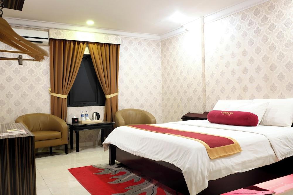 BI EXECUTIVE HOTEL - Tap to explore photos