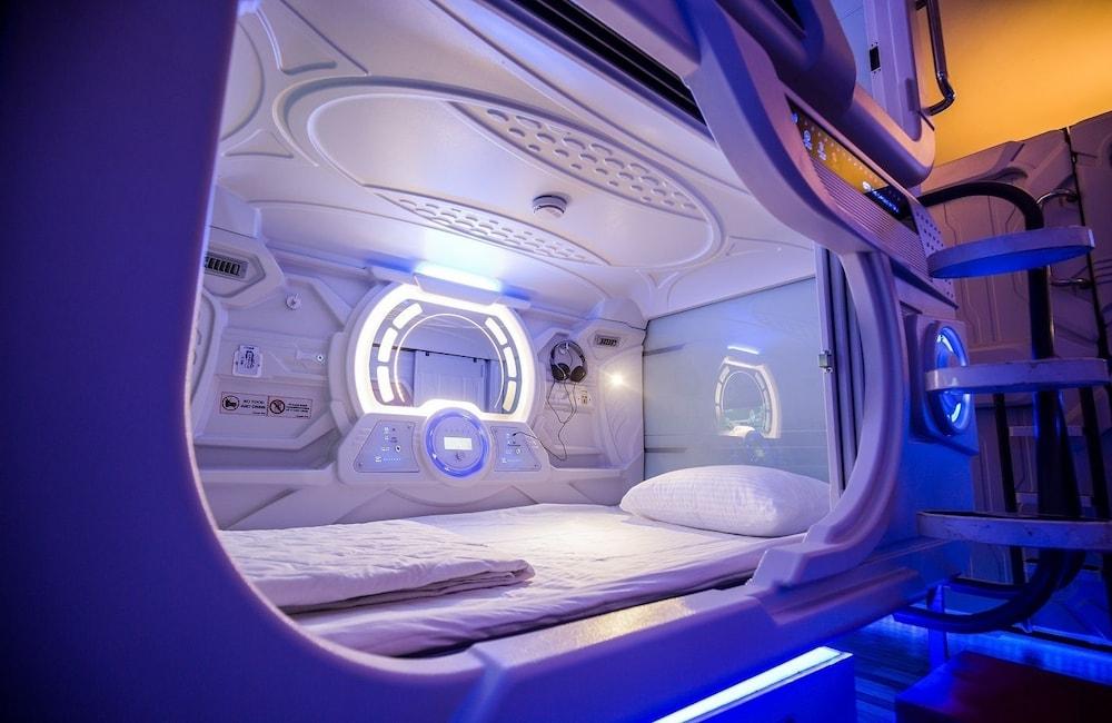 The Capsule Hotel - Tap to explore photos