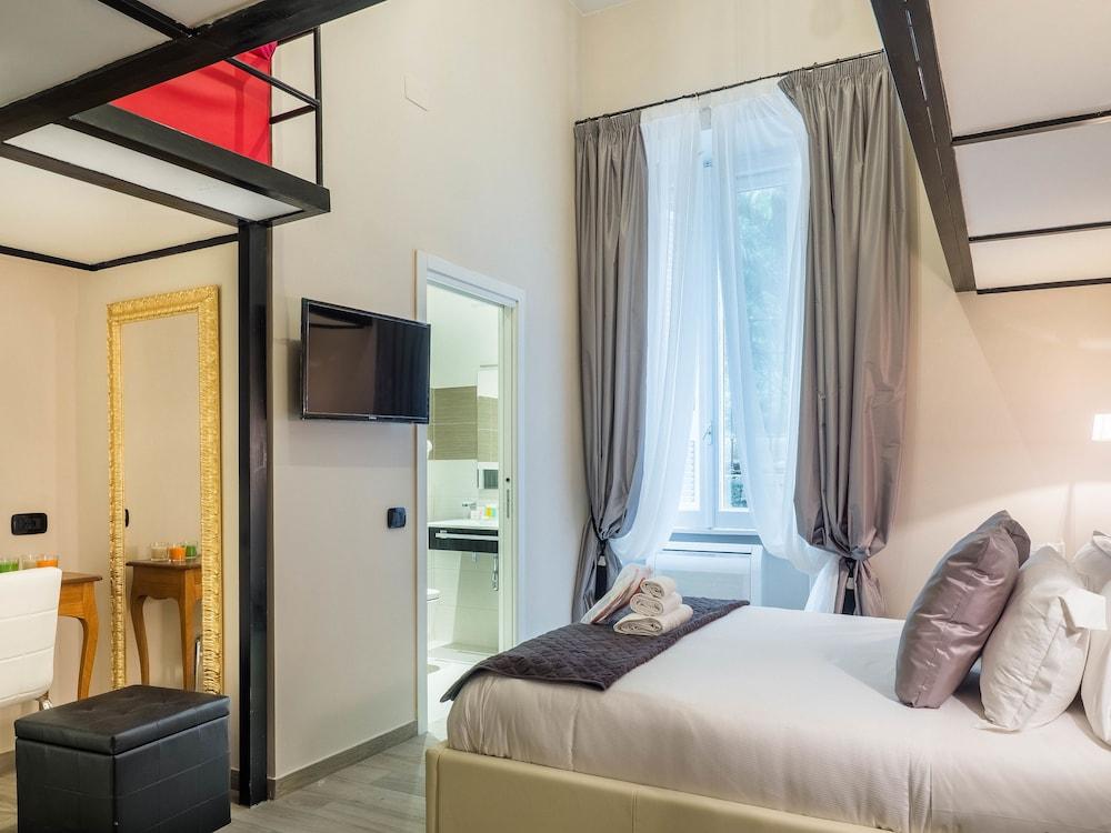 Operà Suites Roma Room Type - Design Triple Room