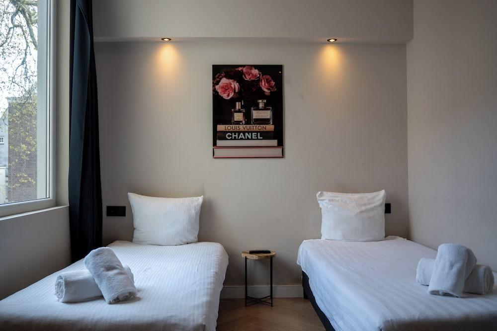 Hotel 83 Room Type - Economy Twin Room