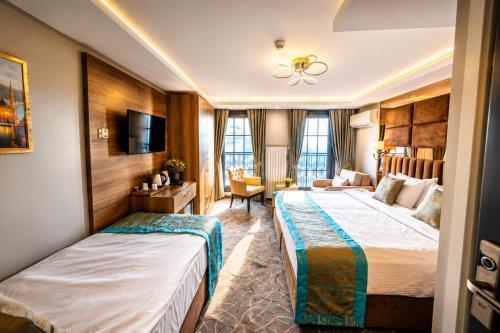 Grand Kavi Hotel - Tap to explore photos