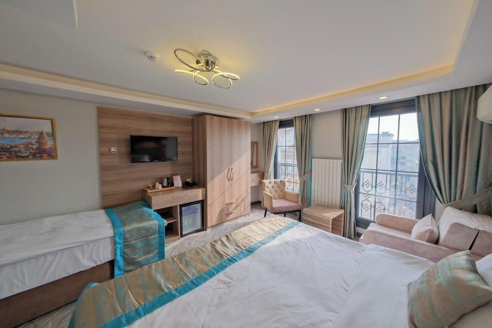 Grand Kavi Hotel Room Type - Superior Triple Room Grand Kavi Hotel Room Type - Superior Triple Room