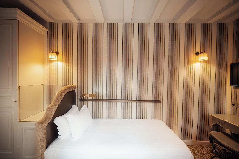 Hotel Odéon Saint Germain - Tap to explore photos