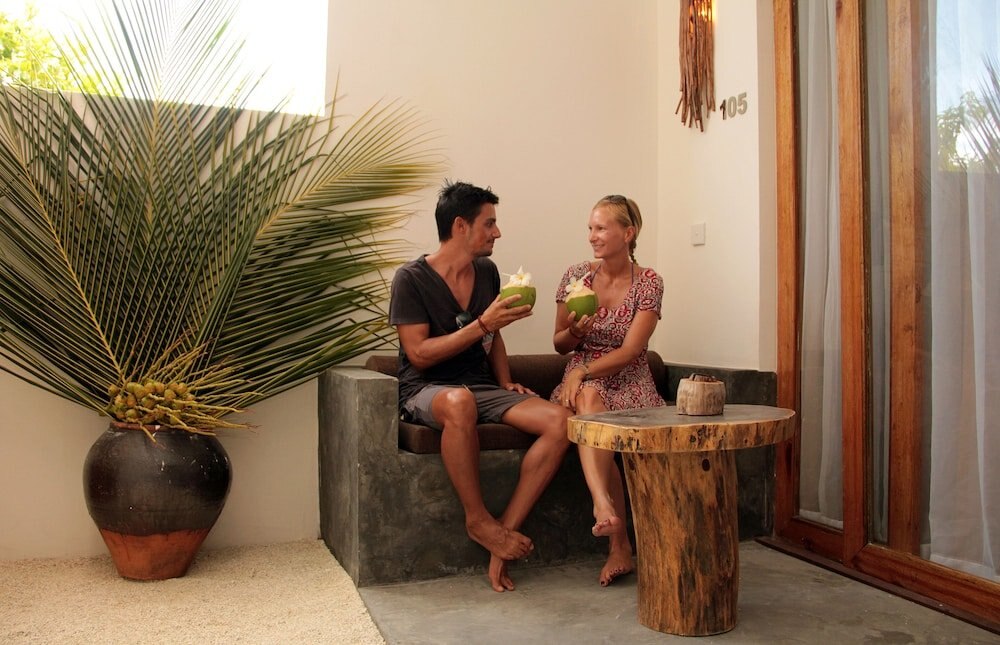 Dhiffushi White Sand Beach Hotel - Tap to explore photos