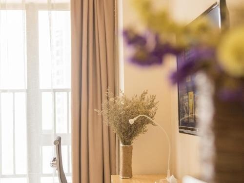 Xizhengjia Apartment Hotel Pazhou Complex - Tap to explore photos