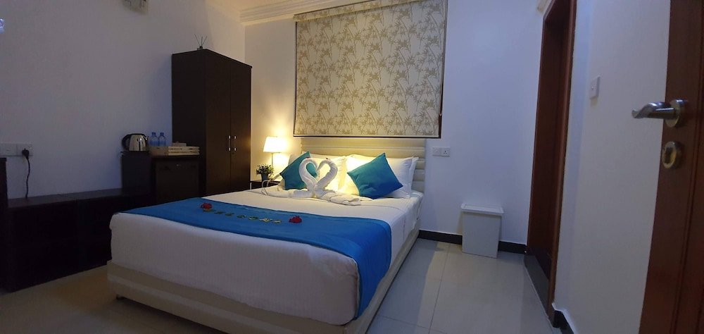 Huvan Beach Room Type - Standard Double Room with Balcony Huvan Beach Room Type - Standard Double Room with Balcony