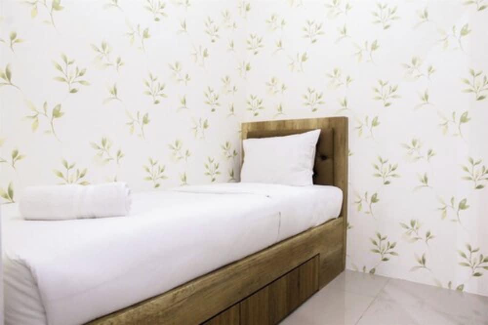 Well Designed 2BR Green Pramuka Apartment - Tap to explore photos