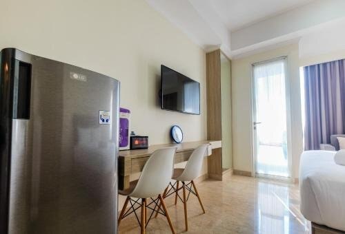 Modern Studio Menteng Park Apartment By Travelio - Tap to explore photos