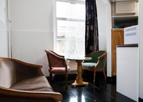 Caledonian Studio Flats Room Type - One-Bedroom Standard Apartment