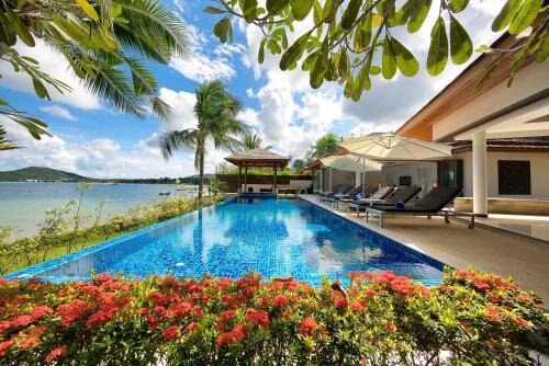 Dhevatara Residence Beachfront Villas Room Type - Baan Benjamart 4BR Beachfront | Chef, Infinity Pool, Kayaks