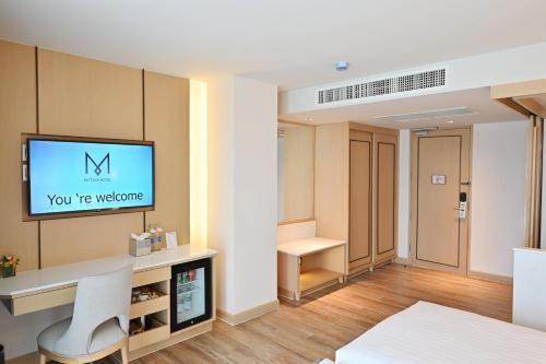 M Pattaya Hotel - Tap to explore photos