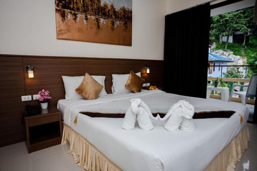 The Wave Patong Boutique Hotel - Tap to explore photos