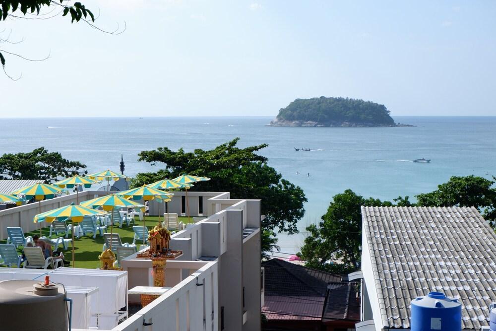 Kata Beachwalk Hotel and Bungalows - Tap to explore photos