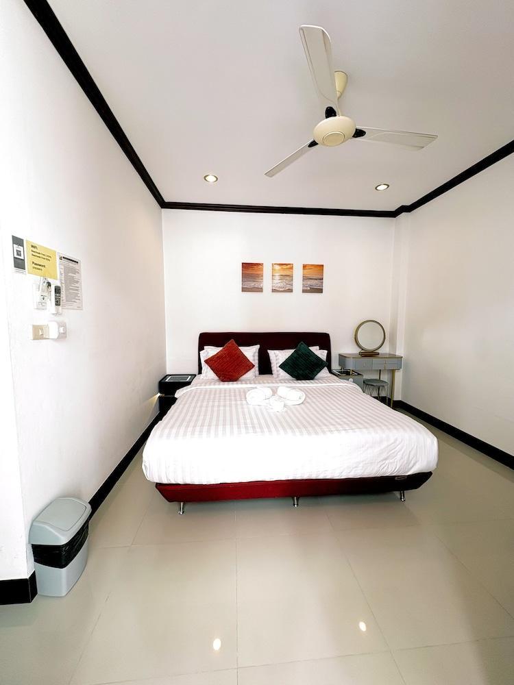 Kata Beachwalk Hotel and Bungalows - Tap to explore photos