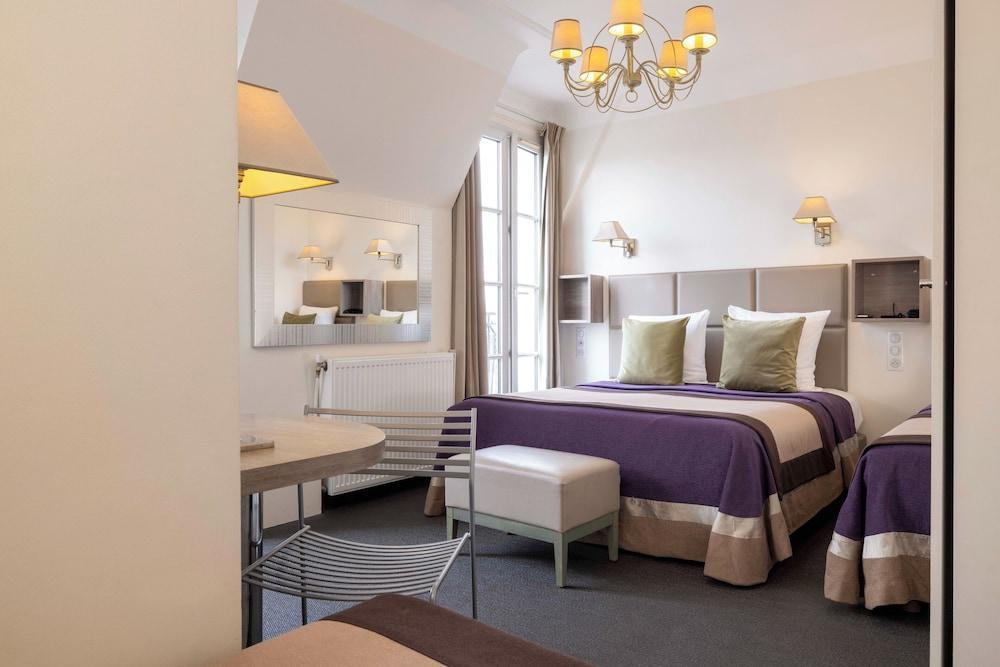 Hotel Saint Pierre Room Type - Chambre quadruple vue tour eiffel