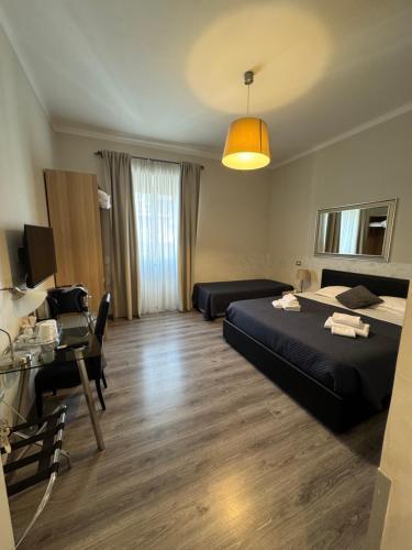 RHS Rienzo Suites Guesthouse Room Type - Deluxe King Room RHS Rienzo Suites Guesthouse Room Type - Deluxe King Room